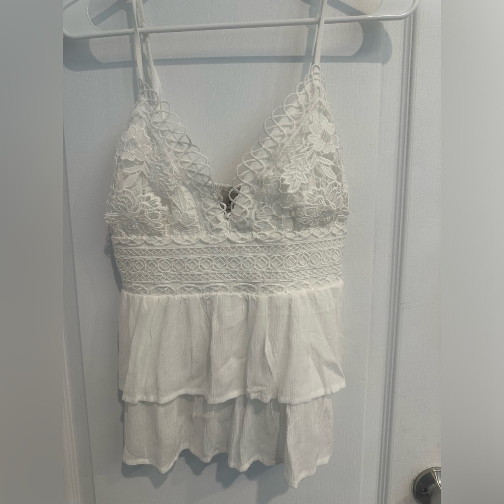 White flowy top